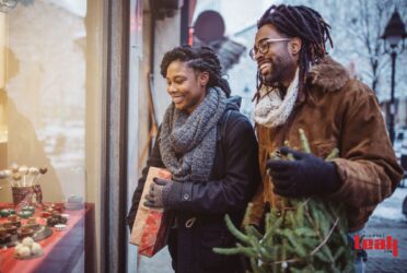 African American couple holiday shopping