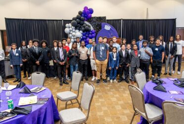 young african american males gathered for a photo for the Bloom Project Birthday Bash